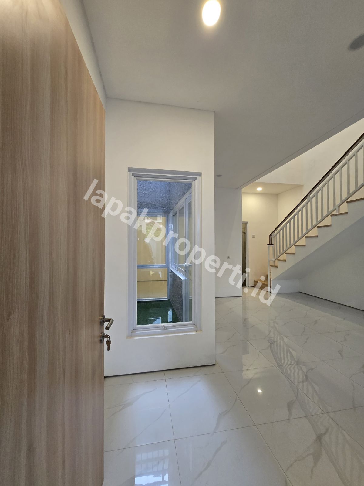 Foto Rumah Modern Dalam Komplek Billymoon Pondok Kelapa Jakarta Timur - 7