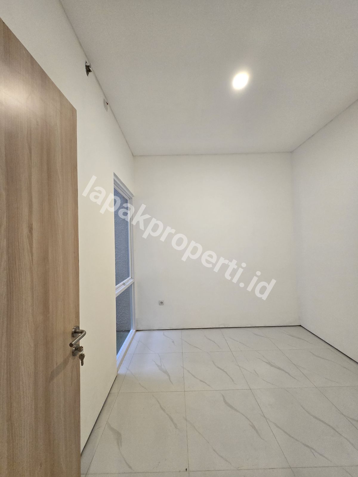 Foto Rumah Modern Dalam Komplek Billymoon Pondok Kelapa Jakarta Timur - 12