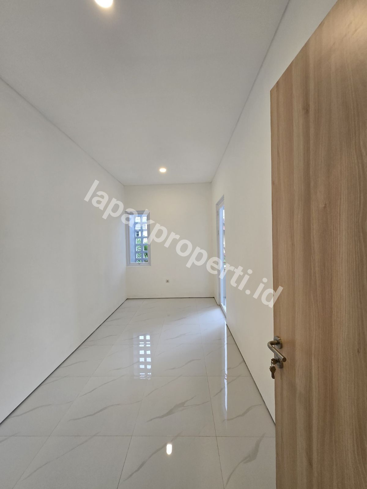 Foto Rumah Modern Dalam Komplek Billymoon Pondok Kelapa Jakarta Timur - 11